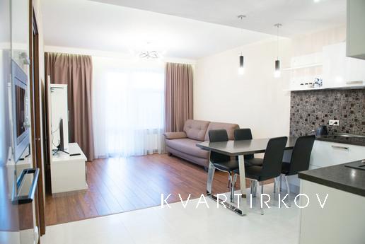 100% реальные фото.Подземная парковка,из которой на лифте с 