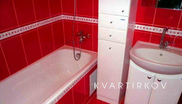 The apartment is within walking distance of the railway cars