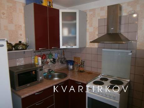 The apartment is within walking distance of the railway cars