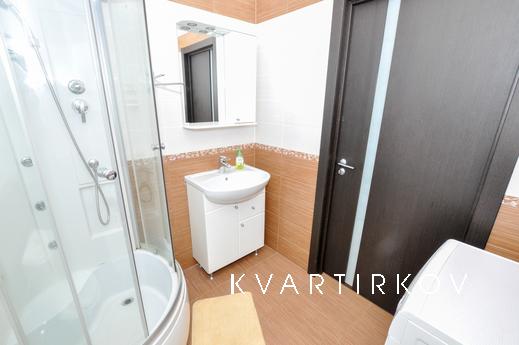 Marin Dom na Bazhova 68, Yekaterinburg - apartment by the day