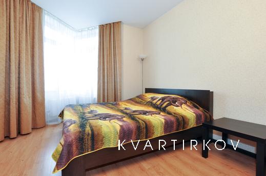 Marin Dom na Bazhova 68, Yekaterinburg - apartment by the day