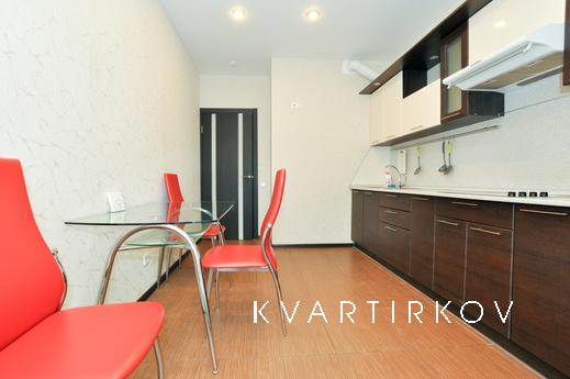 Marin Dom na Bazhova 68, Yekaterinburg - apartment by the day