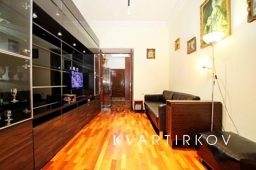 Location: A cozy two-bedroom apartment is located in the his