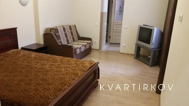 The apartment is located in the old part of the city on vul.