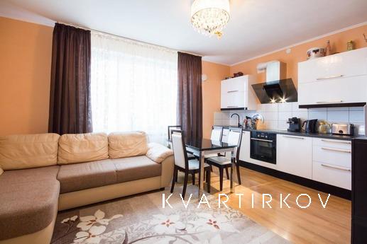 Spacious studio apartment with a balcony, a dressing room an