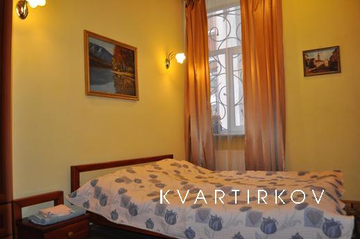 Apartment mini-hotel is located in the city center, in a qui