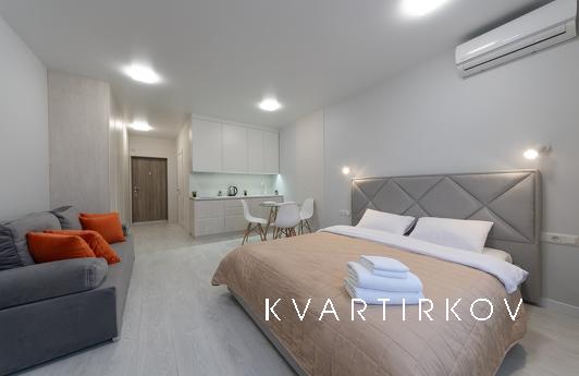 Quiet studio with panoramic views., Kyiv - apartment by the day