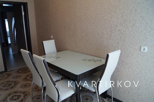 1 комнатная у Нефтегаза посуточно, Тюмень - квартира посуточно