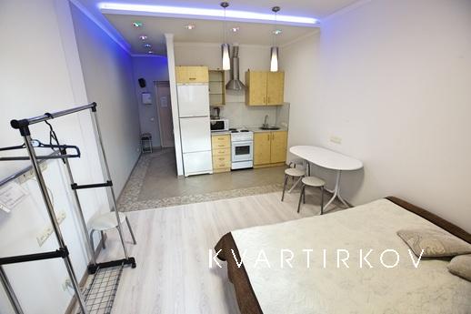 Уютная студия рядом с Аурой., Сургут - квартира посуточно