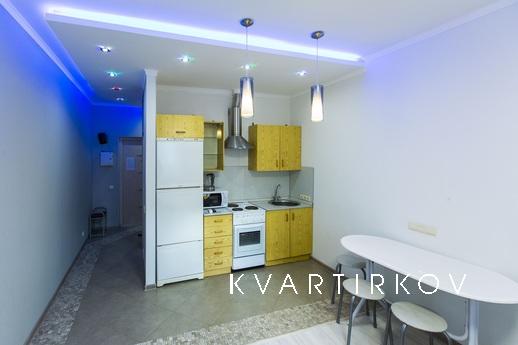 Уютная студия рядом с Аурой., Сургут - квартира посуточно