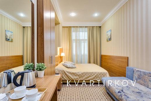 A cozy room in a mini-hotel on Tverskaya for two people. A s