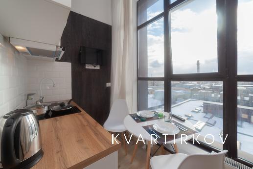 The apartment is located in the business-class residential c