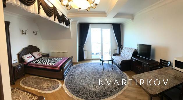 The house is located in a quiet place in the area of the cen