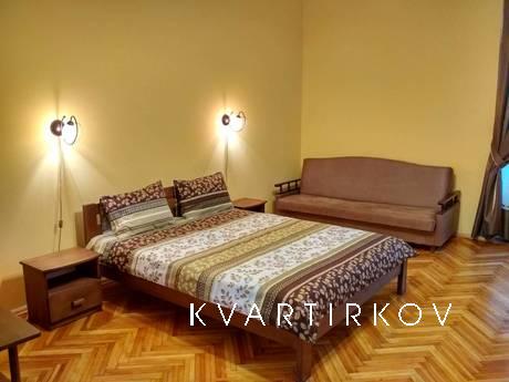 The apartment is located in the historic center of the city,