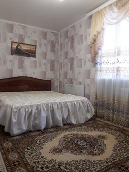 The apartment is located in the city center near the park, s