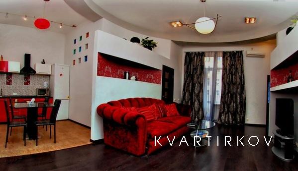 Luxury apartment with stylish furnishings, high ceilings and