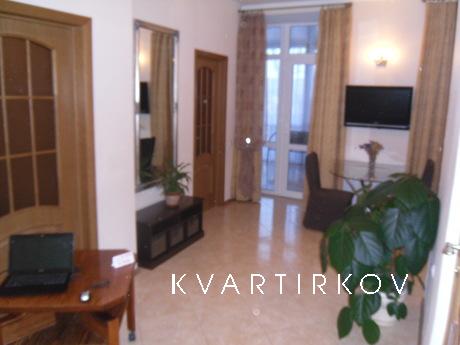 Cozy 2-bedroom apartment with private patio and parking, 5 m