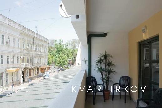 New building at the corner of Deribasovs, Odessa - apartment by the day