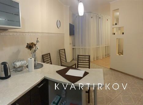 Bright spacious studio apartment with a kitchen-living room,