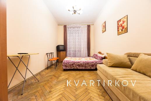 The apartment is located in the heart of the city. Five minu