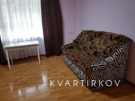 One bedroom apartment in the city center, Yuzhny - apartment by the day