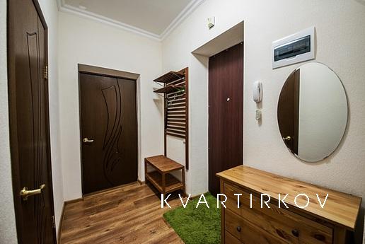 Современные комфортабельные апартаменты, по-домашнему уютные