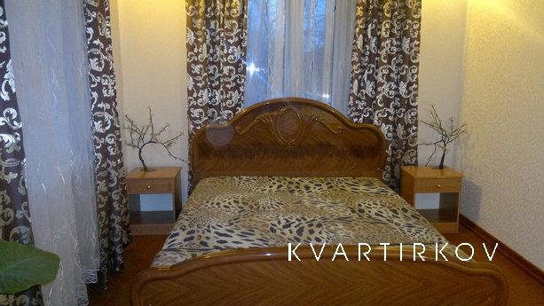 A house with a fireplace in the center, Kamianets-Podilskyi - apartment by the day