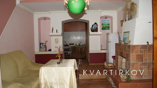 A house with a fireplace in the center, Kamianets-Podilskyi - apartment by the day