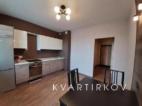 The apartment is located in the center of the city with a de