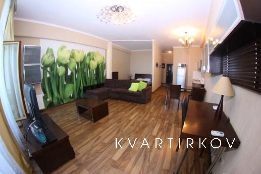 Beautiful, modern studio apartment with a separate bedroom (