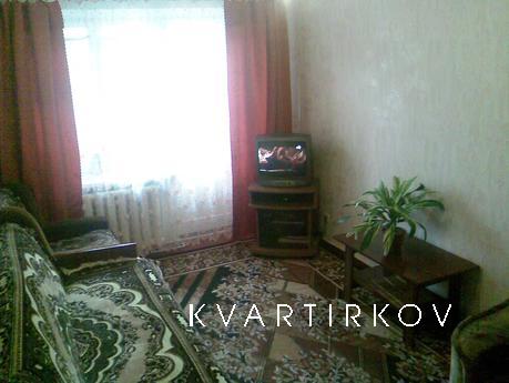 The apartment is located in the city center, close to home p