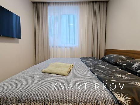 Нова 2-кімнатна квартира з окремою спальнею та сучасною ванн