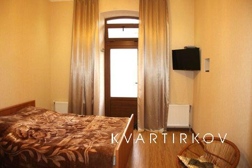 There are two identical (mirror) one-room, well-equipped apa